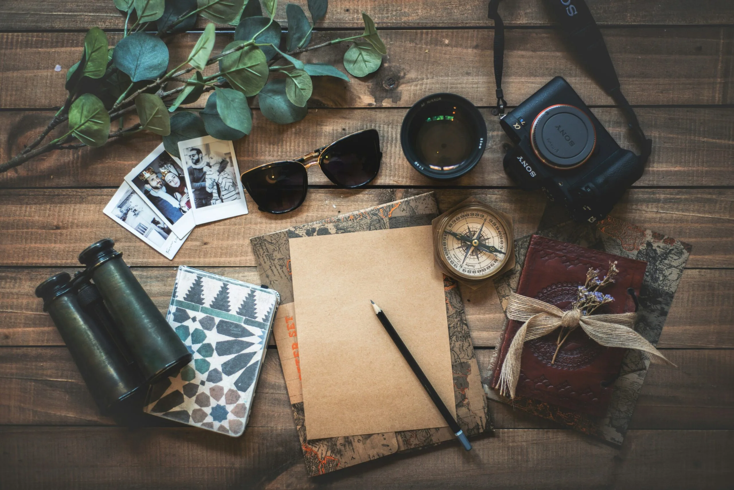 Top Travel Gadgets You Need for Your Next Adventure 1 photo of assorted items on wooden table